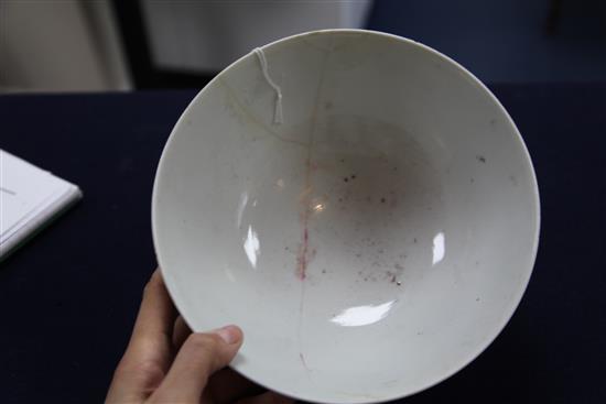 A Chinese famille rose dragon and phoenix bowl, Jiaqing seal mark, late 19th / early 20th century, diam. 21cm, broken and repaired